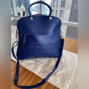 Authentic Furla bag purchased in Paris. excellent condition. Navy/royal blue